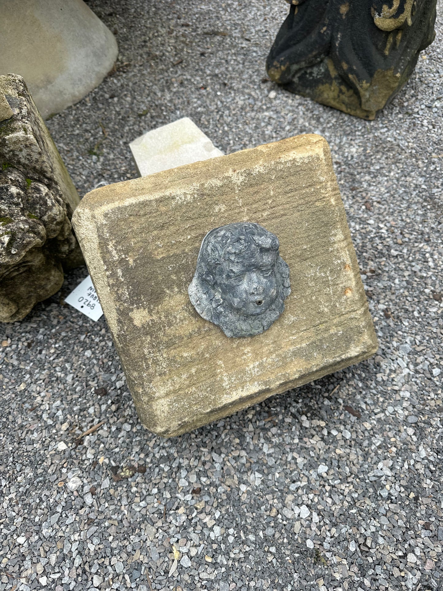 Lead Mask on Stone Base